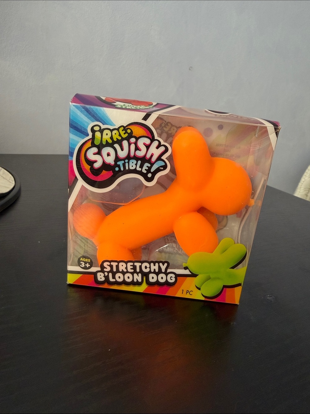 Ja-Ru irre-SQUISH-tible Stretchy Balloon Dog- Orange (NIB)